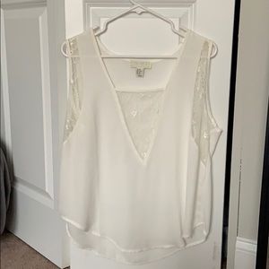 White lacey top with v plunge